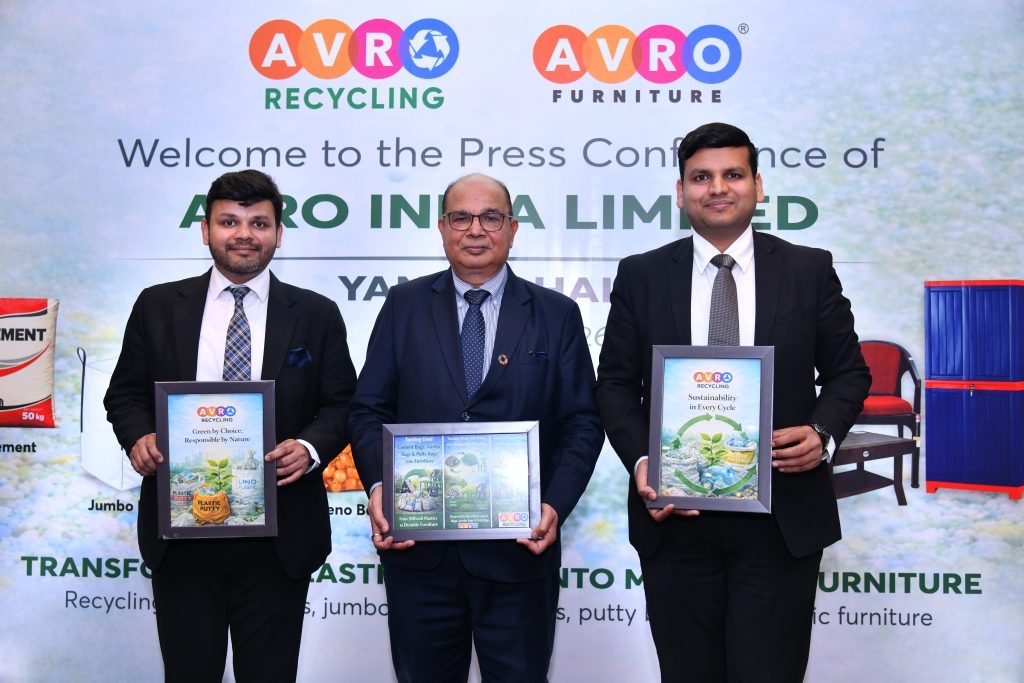 Prof. (Dr.) Sushil Aggarwal, Chairman of Avro India Limited, addressing media representatives during a press conference, seated at a table with microphones, speaking on industry and sustainability initiatives.